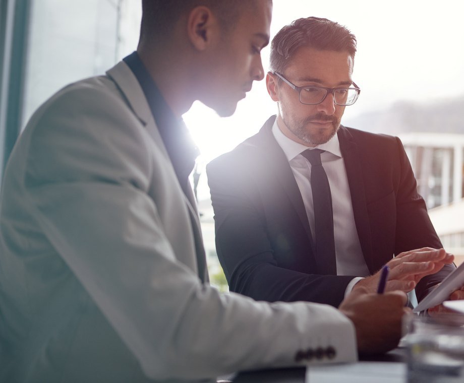 NEXO Services consultant speaking with a client