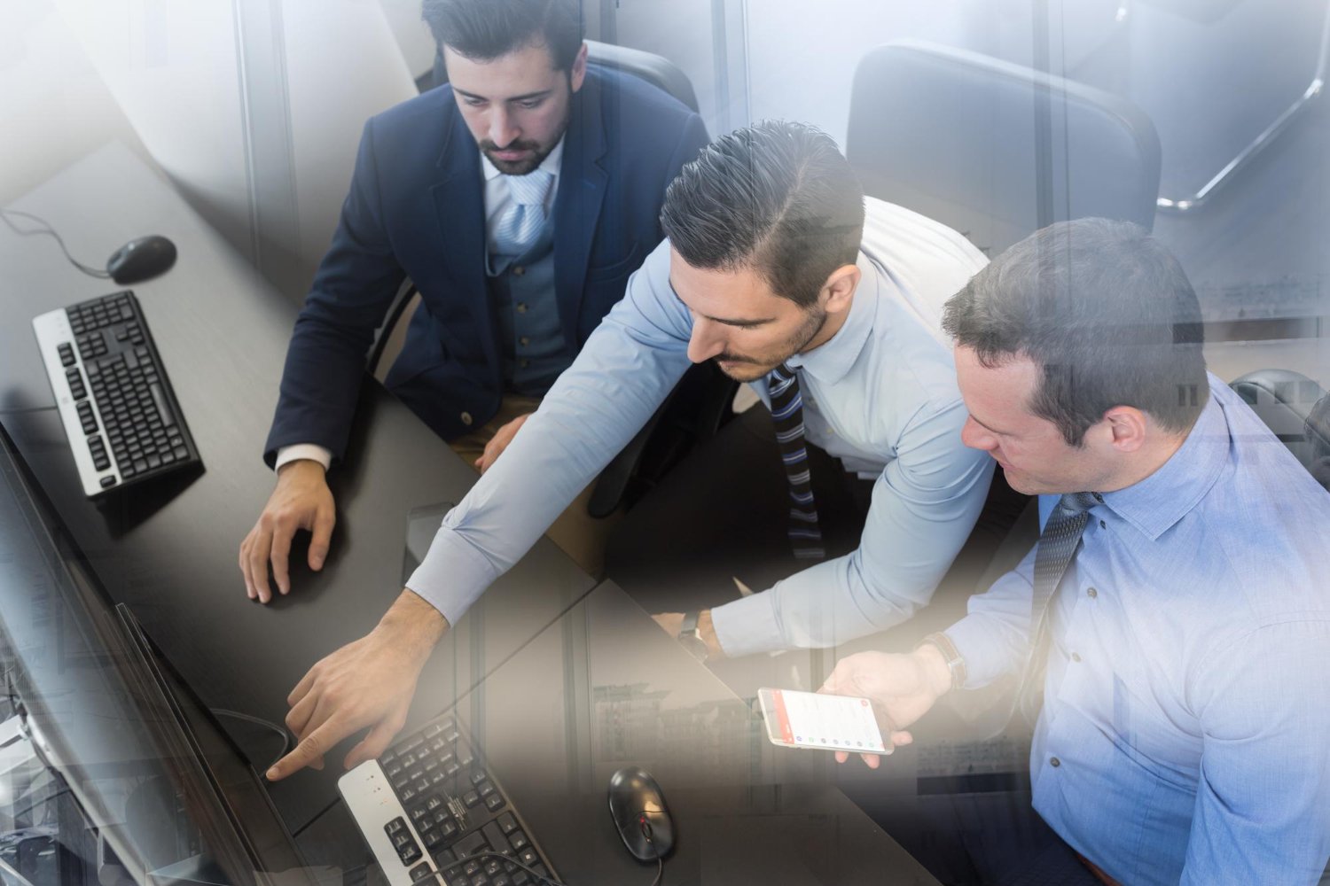 NEXO consultants reviewing a corporate service plan